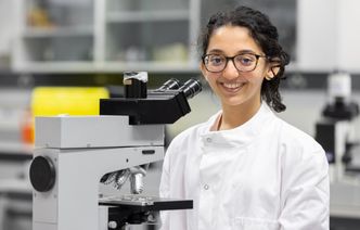 A woman working in a laboratory