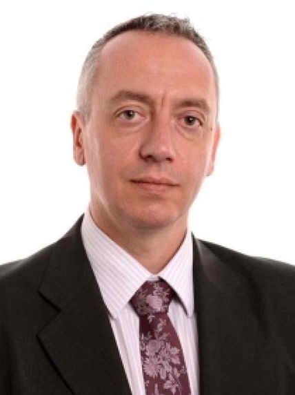 Dr Roger Tatoud