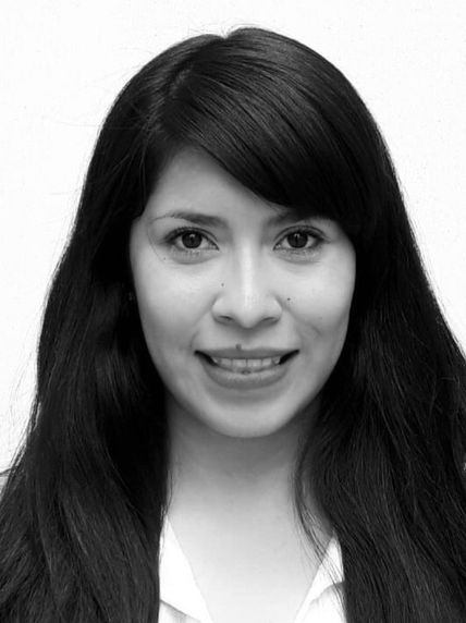 black and white headshot of woman smiling