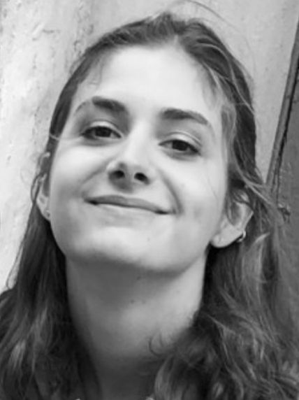black and white cropped photo of woman smiling