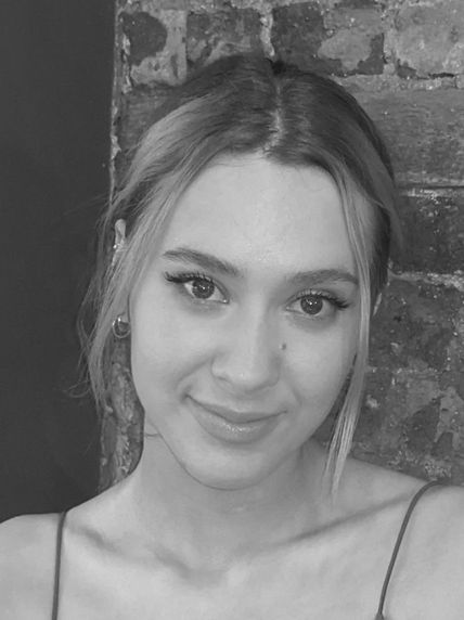 Headshot of Lucy smiling