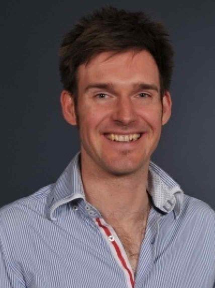 Headshot of Dr Alex Whittaker