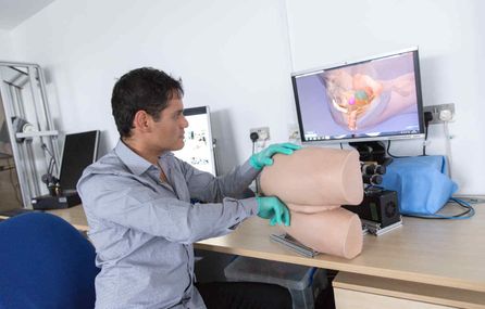 Alejandro Granados tests the haptic rectal examination trainer