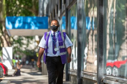 SECURITY OFFICE WEARING MASK