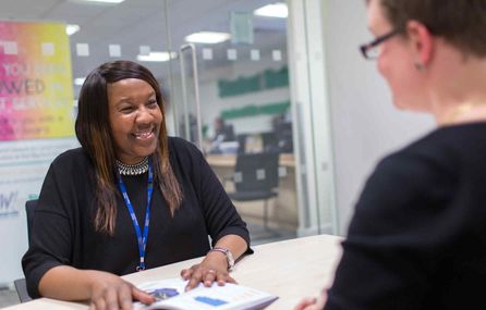 Staff member smiling