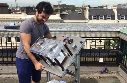 Jose moving our experiment around so that it faces the sun at the right angle