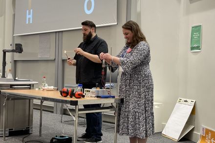 Dan Plane carrying out hydrogen explosion demo with Anna Hankin