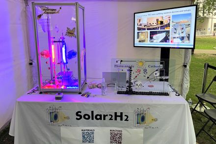 Solar Hydrogen stall at GERF 2022 with hydrogen cannon and marble run simulator of electron transport