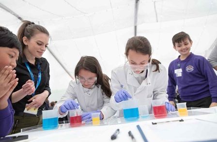 School students take part in an experiment