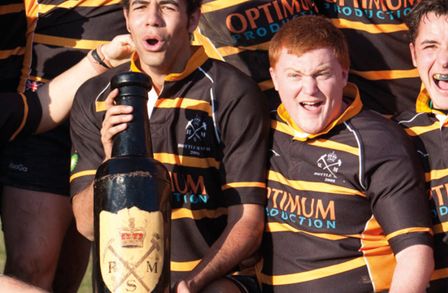 RSM Rugby team with the bottle
