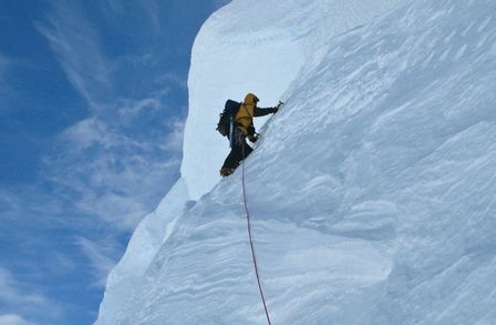 Man climbing an iceberg