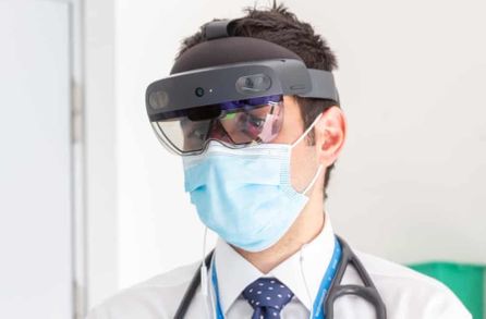 Louis Koizia wears the Microsoft HoloLens in a clinic