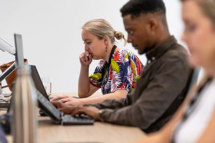 Staff on their computers