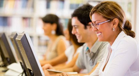 Students working online at the Library