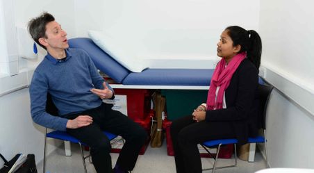 Patient and student in a communications session