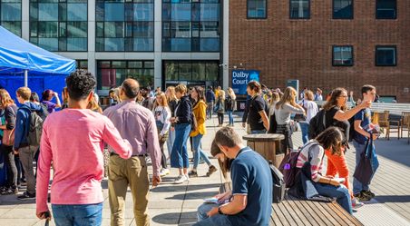 A crowd gathered at an open day event.