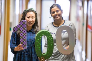 Two students celebrating 100 years of the Women's Engineering Society