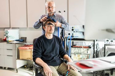 In the Nick Davey Neurophysiology Laboratory, Paul Strutton and a student are conducting cortical and reflex control of movement tests