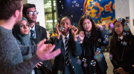 Bubbles enthral school students with our science at an Imperial Lates event