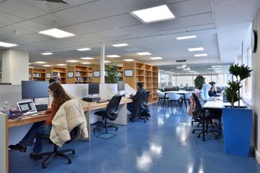 Students studying at desks in Hammersmith Medical Library