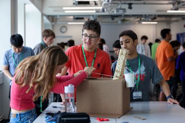 GSS engineering students building robot