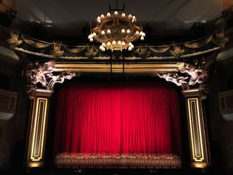 Stage with a red curtain