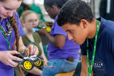 Students taking part in electronics-based activity at Sutton Trust event