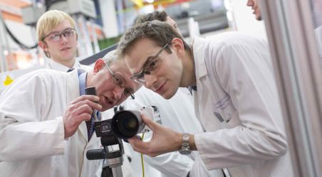 Students and staff in the lab