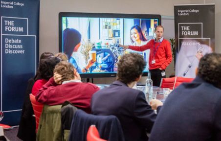 Man presenting in front of people