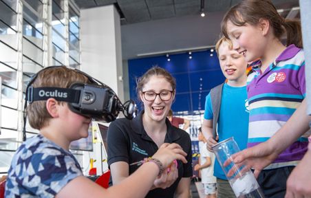 child engaging in virtual reality public engagement activity