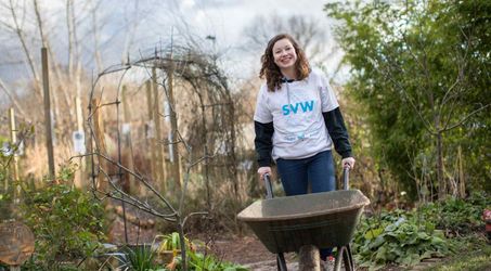 Girl with wheelbarrow