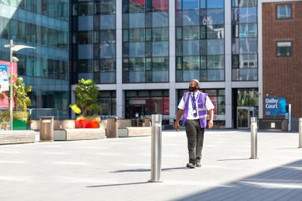 Staff walking near Dalby Court