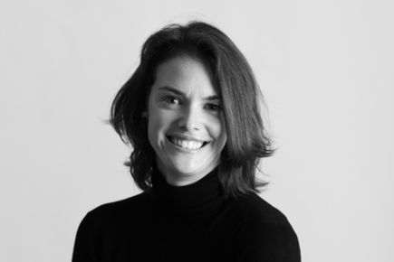 Portrait of Morgan Mixon, one of the Entrepreneur's Pledgers, smiling against a grey background