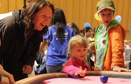 Mum and kids play pool game