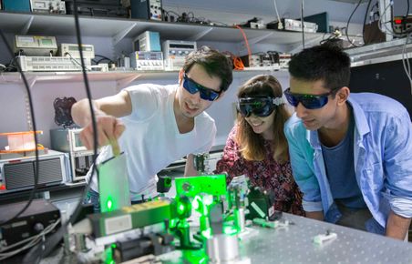 Students working with lasers