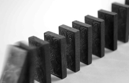 A row of dominoes falling