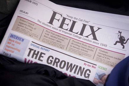 close up Felix newspaper on black background
