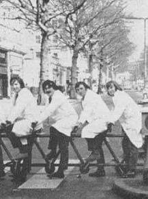 Medical students on a large bicycle outside St Mary's