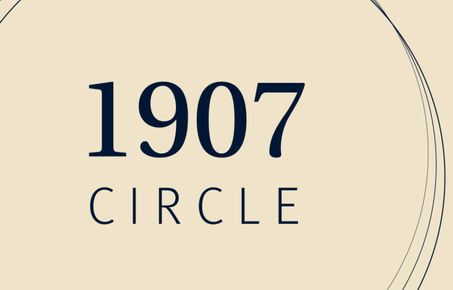 Graphic with 1907 Circle written in black on a cream background