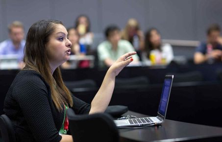 Student making a point in a seminar