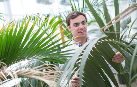 Silwood student surrounded by plants