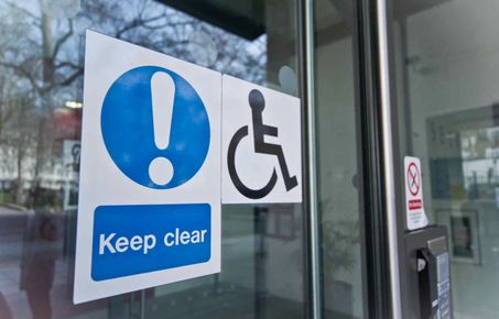 photo of wheelchair sticker on door