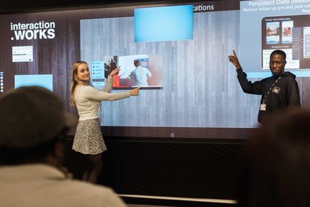 Large interactive screen in meeting space