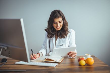 Young woman sitting at desk