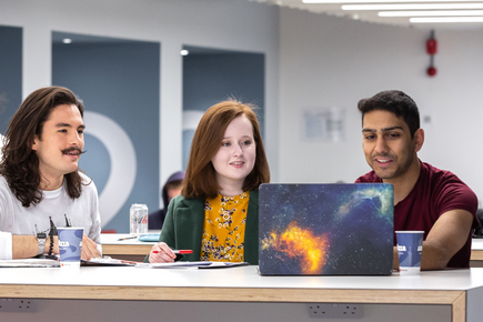 Aeronautics students studying with laptop