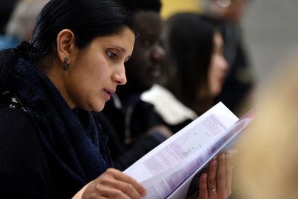 Woman reading a briefing paper