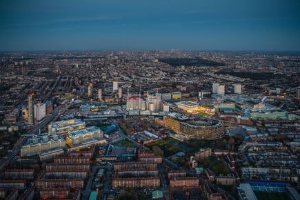 Aerial photographs of White City Innovation District in the evening, night, lights, technology by Jason Hawkes