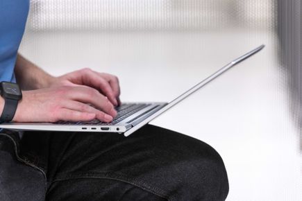 Image of laptop on someone's lap