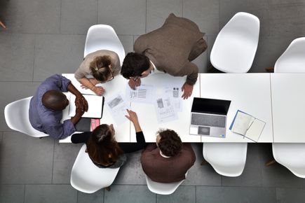 Group working around a table