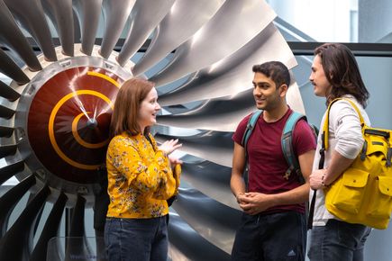 three students chatting